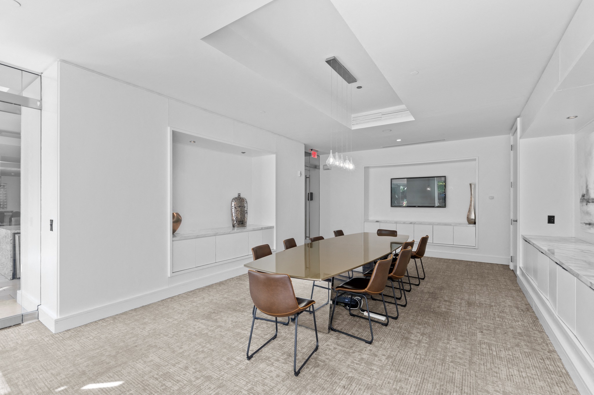 a large conference room with a large table and chairs
